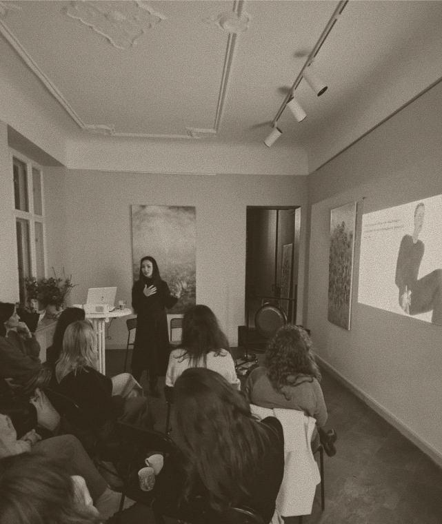 Sara speaking at a workshop
