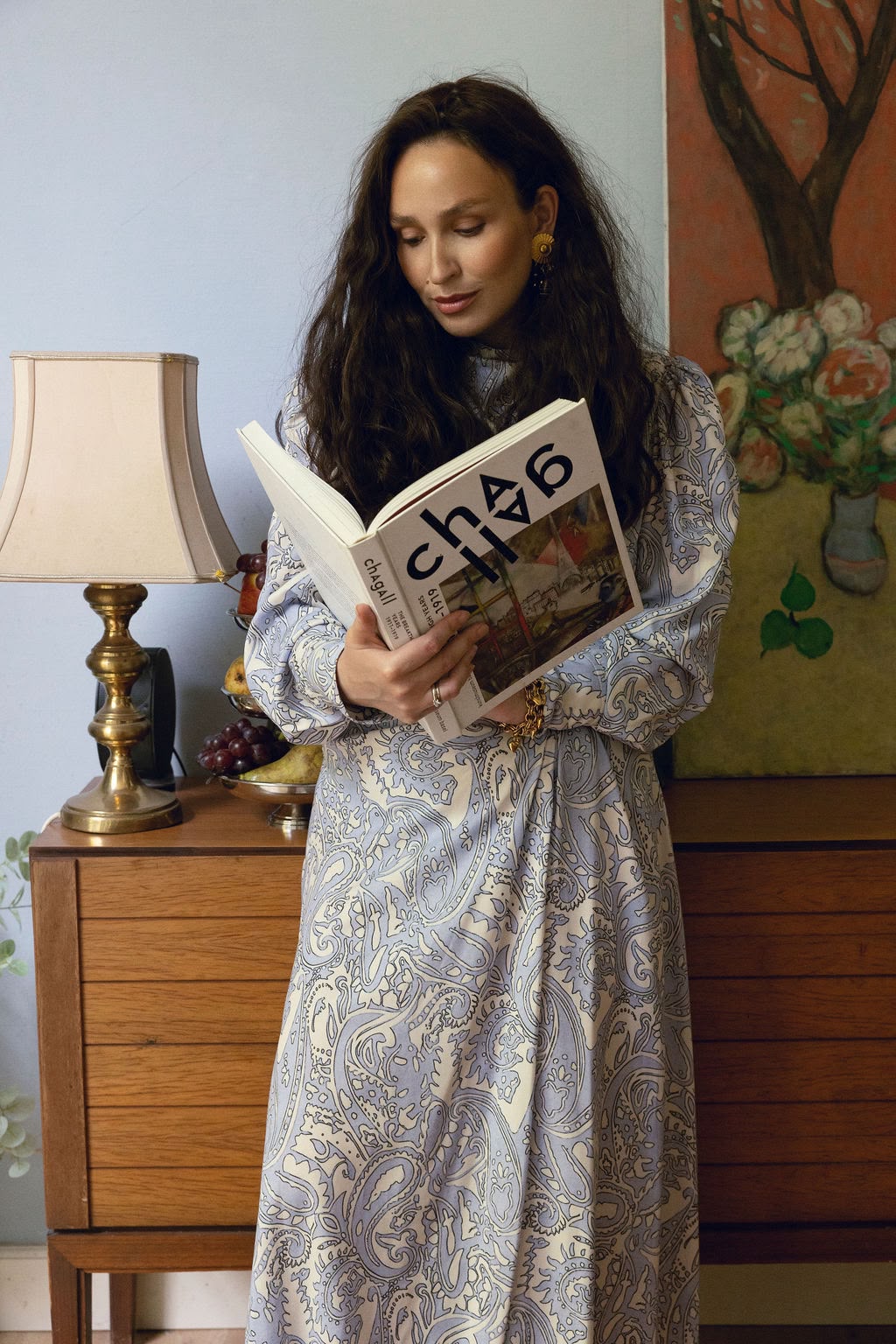 Sara Edelman reading at home